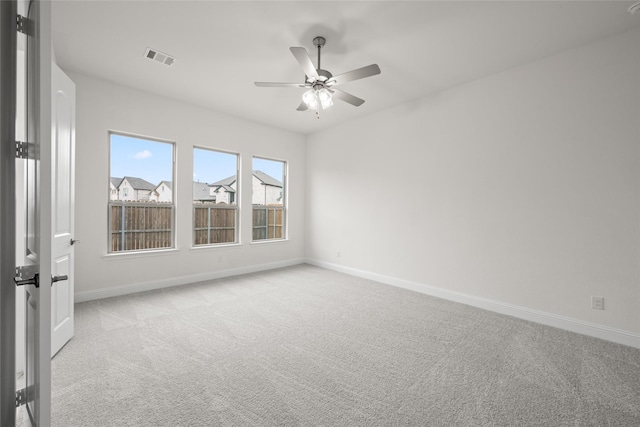 1021 Allegheny Ct, Burleson, TX 76028 - empty room with light colored carpet, baseboards, and ceiling fan