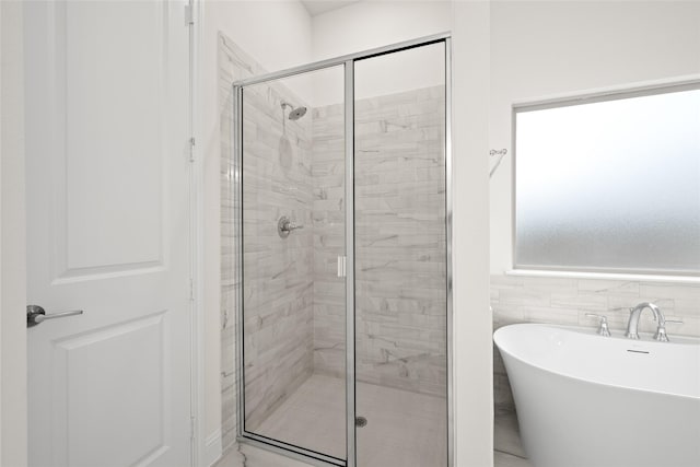 1021 Allegheny Ct, Burleson, TX 76028 - bathroom with a shower stall and a freestanding bath