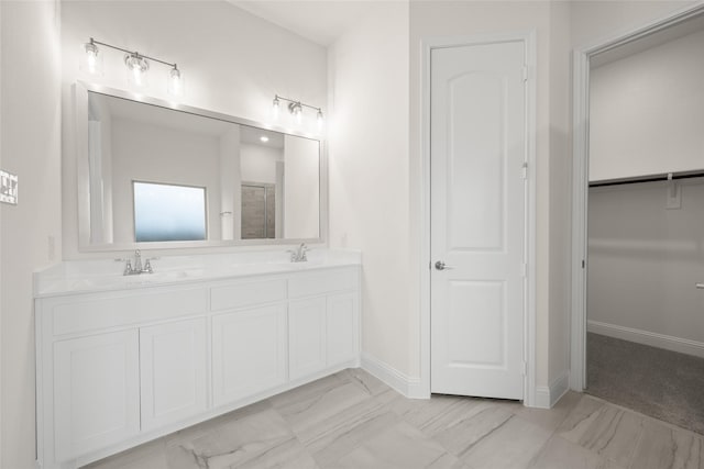 1021 Allegheny Ct, Burleson, TX 76028 - bathroom featuring double vanity, marble look tiles, baseboards, and a shower