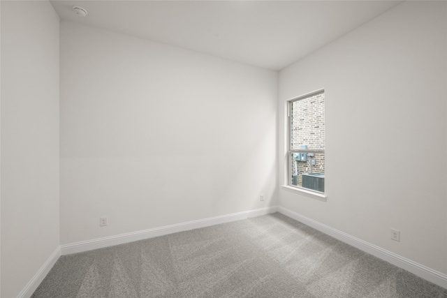 1021 Allegheny Ct, Burleson, TX 76028 - carpeted empty room featuring a smoke detector and baseboards