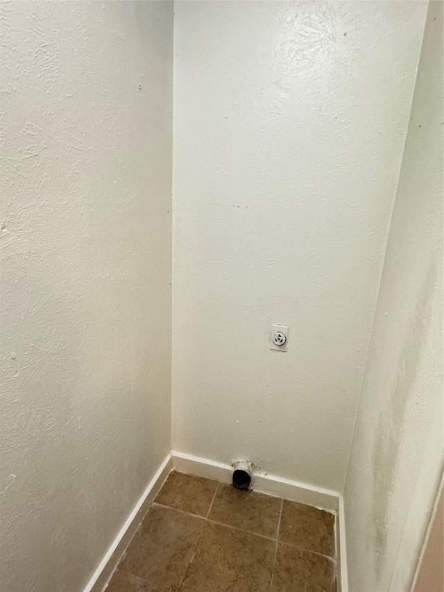 5412 Brookhollow Dr, Sachse, TX 75048 - washroom featuring hookup for an electric dryer, baseboards, and dark tile patterned floors