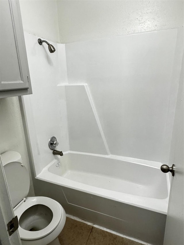5412 Brookhollow Dr, Sachse, TX 75048 - full bath with tile patterned flooring, toilet, and washtub / shower combination