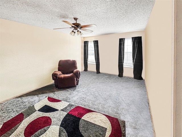 424 Chatman St, Hutchins, TX 75141 - sitting room with carpet floors, a textured ceiling, and ceiling fan
