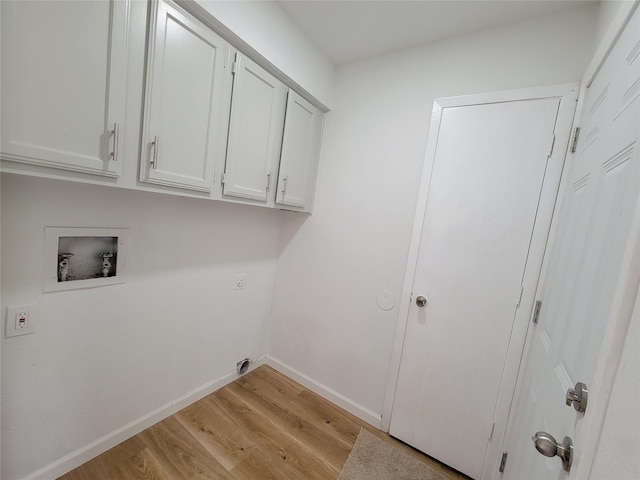 2317 Woodhollow Ave, Mesquite, TX 75150 - washroom with cabinet space, light wood-type flooring, baseboards, hookup for a washing machine, and electric dryer hookup