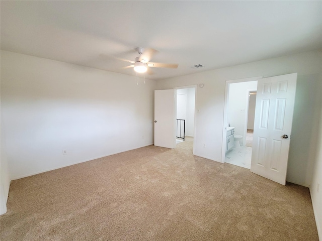 2317 Woodhollow Ave, Mesquite, TX 75150 - unfurnished bedroom with light colored carpet and ensuite bathroom