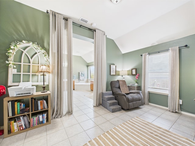 1409 Stoney Hills Dr, Cedar Hill, TX 75104 - living area with vaulted ceiling, tile patterned floors, and baseboards