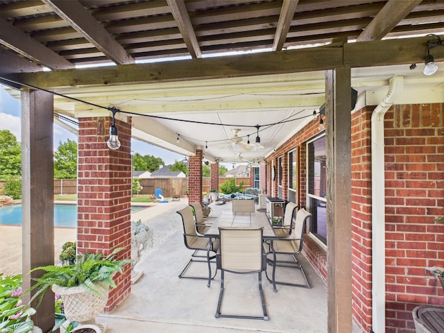 1409 Stoney Hills Dr, Cedar Hill, TX 75104 - fenced backyard with a patio and outdoor dining area