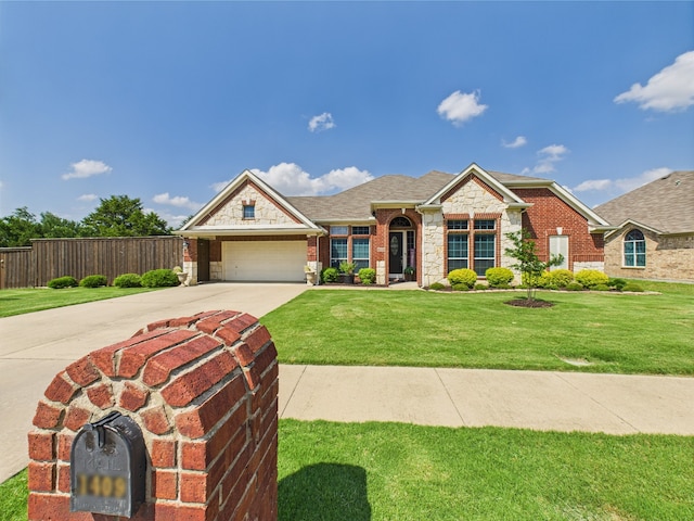 1409 Stoney Hills Dr, Cedar Hill, TX 75104 - view of front facade featuring concrete driveway, an attached garage, stone siding, and brick siding