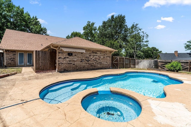 410 Etheridge Rd, Canton, TX 75103 - view of swimming pool featuring a patio, french doors, a fenced backyard, and a pool with connected hot tub