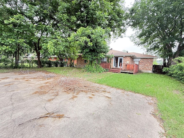 3106 Marydale Rd, Garland, TX 75041 - view of yard with a deck