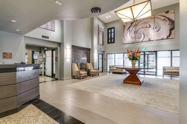 330 Las Colinas Blvd E Unit 140, Irving, TX 75039 - lobby with a towering ceiling and recessed lighting