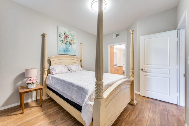 330 Las Colinas Blvd E Unit 140, Irving, TX 75039 - bedroom featuring light wood-style flooring and baseboards