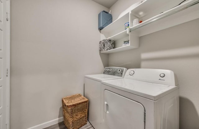 1568 Glacier Rdg, Royse City, TX 75189 - laundry area with separate washer and dryer, baseboards, and wood finished floors