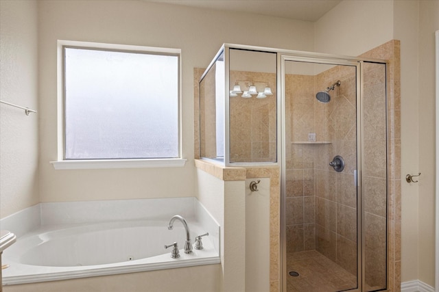 7017 Westover Dr, Granbury, TX 76049 - bathroom with a garden tub and a shower stall