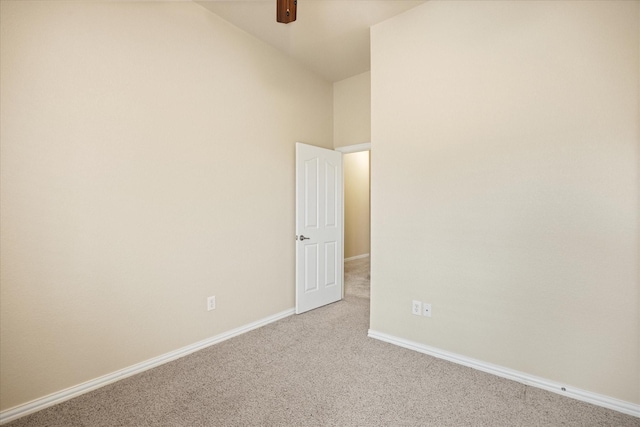 7017 Westover Dr, Granbury, TX 76049 - spare room featuring carpet flooring, baseboards, vaulted ceiling, and ceiling fan