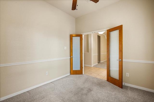 7017 Westover Dr, Granbury, TX 76049 - unfurnished bedroom with carpet, lofted ceiling, ceiling fan, tile patterned floors, and baseboards
