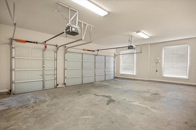 7017 Westover Dr, Granbury, TX 76049 - garage featuring a garage door opener