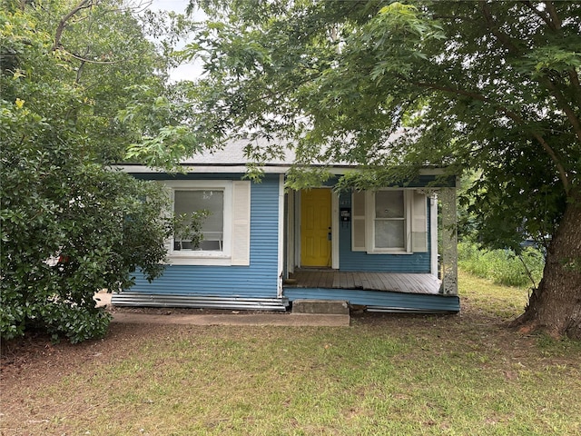 1435 Natalie St, Shreveport, LA 71108 - view of front of house featuring a front lawn and covered porch