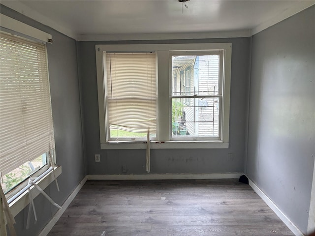 1435 Natalie St, Shreveport, LA 71108 - empty room featuring plenty of natural light, wood finished floors, and baseboards
