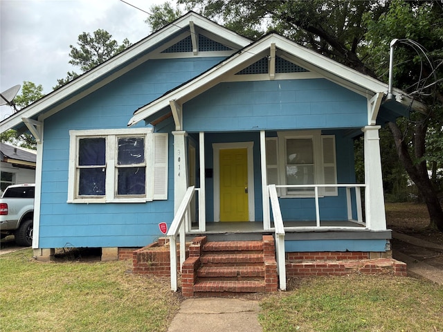 3014 Desoto St, Shreveport, LA 71109 - view of front of home featuring a front lawn and a porch