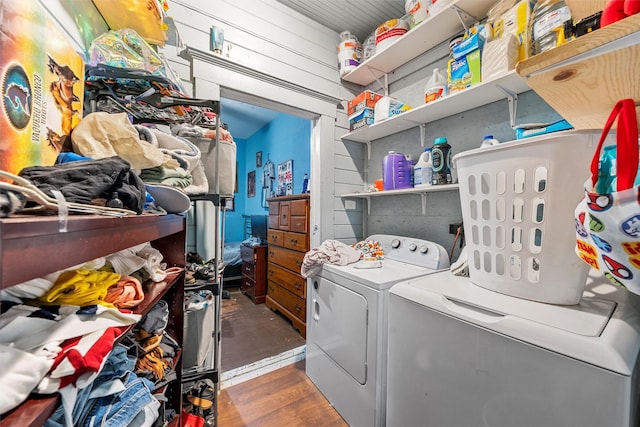 1615 Mitchell Ave, Waco, TX 76708 - laundry room with independent washer and dryer and wood finished floors