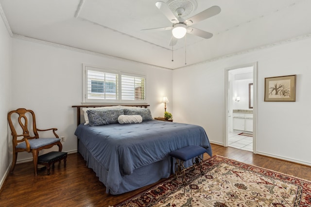 7422 Whispering Pines Dr, Dallas, TX 75248 - bedroom featuring wood finished floors, ensuite bath, baseboards, a ceiling fan, and a raised ceiling