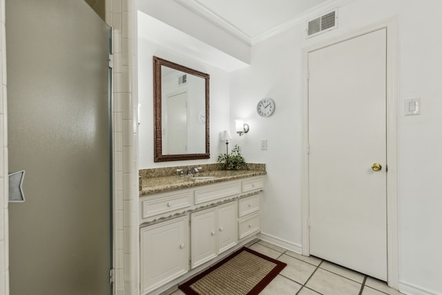 7422 Whispering Pines Dr, Dallas, TX 75248 - full bathroom with vanity, ornamental molding, a stall shower, tile patterned floors, and baseboards