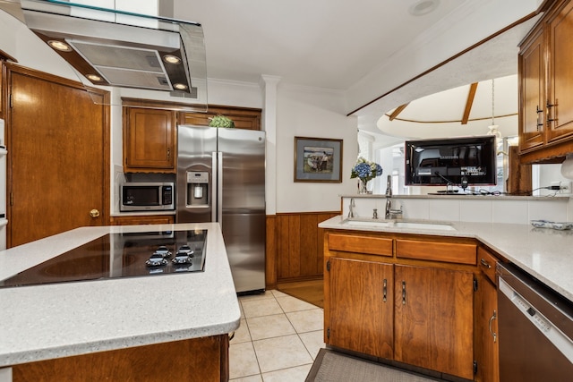 7422 Whispering Pines Dr, Dallas, TX 75248 - kitchen with stainless steel appliances, ventilation hood, a sink, light countertops, and brown cabinetry