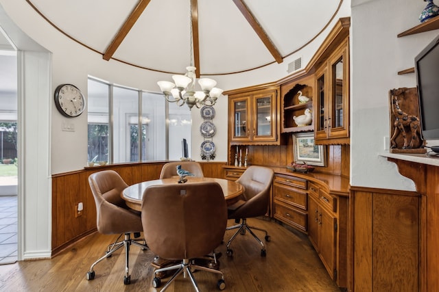 7422 Whispering Pines Dr, Dallas, TX 75248 - dining space with wainscoting, wooden walls, wood finished floors, a chandelier, and a desk