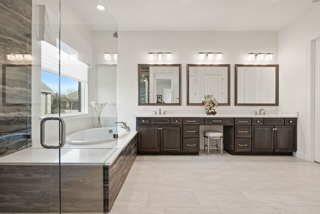12305 Glenbrook St, Denton, TX 76207 - bathroom with double vanity, a garden tub, recessed lighting, and an enclosed shower