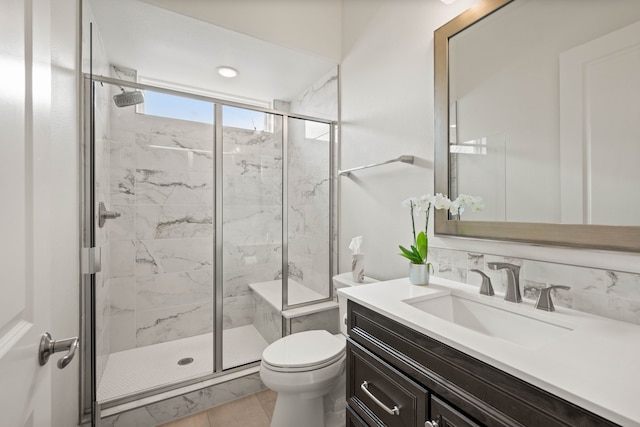 12305 Glenbrook St, Denton, TX 76207 - full bath featuring toilet, a marble finish shower, and vanity