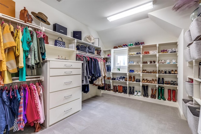 3929 Lively Ln, Dallas, TX 75220 - walk in closet featuring lofted ceiling and light carpet