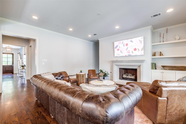 3929 Lively Ln, Dallas, TX 75220 - living room with crown molding, wood finished floors, a fireplace with raised hearth, recessed lighting, and built in shelves