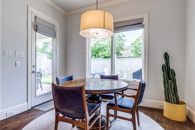 3929 Lively Ln, Dallas, TX 75220 - dining space with dark wood finished floors, baseboards, and crown molding