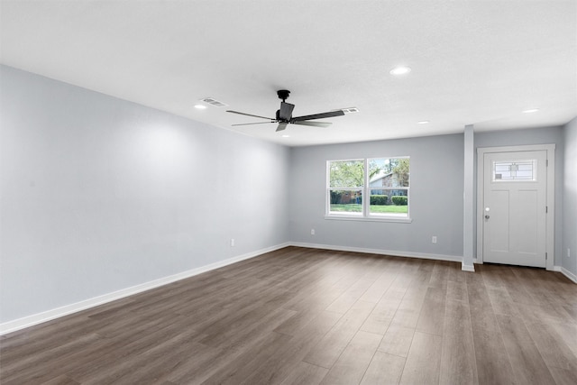1816 Evans Dr, Waco, TX 76705 - spare room featuring plenty of natural light, ceiling fan, dark wood-type flooring, recessed lighting, and baseboards