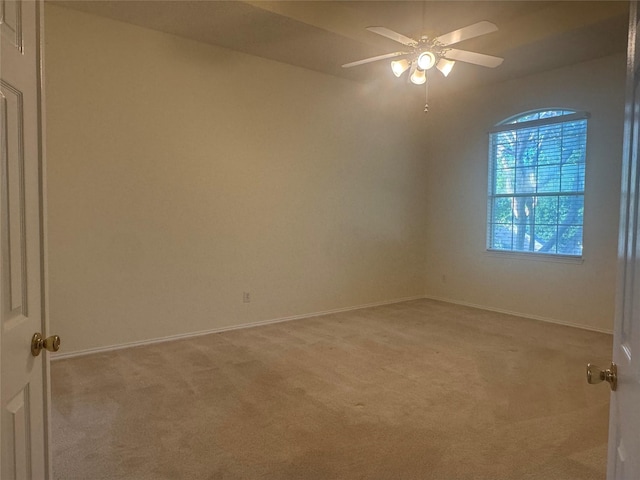 2802 Sunrise Dr, Rowlett, TX 75088 - empty room featuring light carpet, ceiling fan, and baseboards