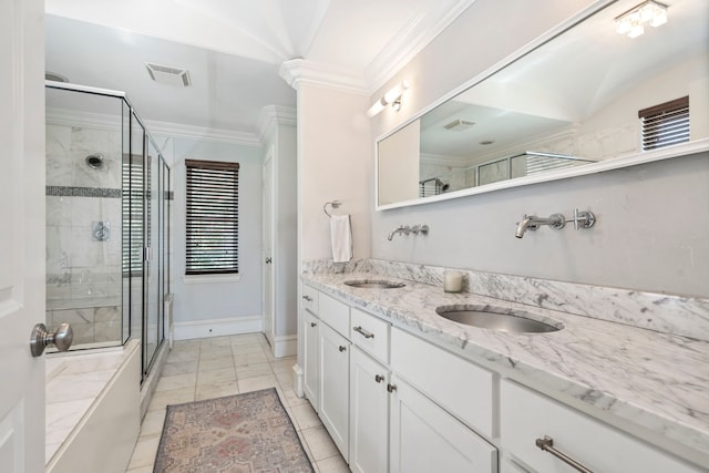 857 N Glasgow Dr Unit C, Dallas, TX 75214 - full bathroom featuring double vanity, a stall shower, ornamental molding, baseboards, and marble finish floors