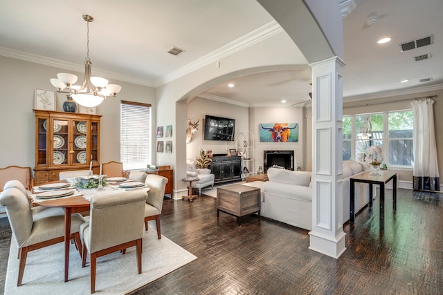 857 N Glasgow Dr Unit C, Dallas, TX 75214 - dining space featuring arched walkways, ornamental molding, decorative columns, dark wood-style floors, and a chandelier