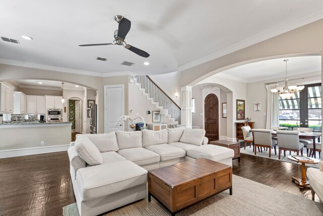 857 N Glasgow Dr Unit C, Dallas, TX 75214 - living area featuring arched walkways, a ceiling fan, a chandelier, wood finished floors, and recessed lighting