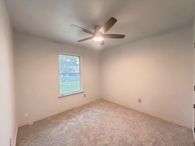 102 Janis St, Alvarado, TX 76009 - carpeted empty room with ceiling fan and baseboards