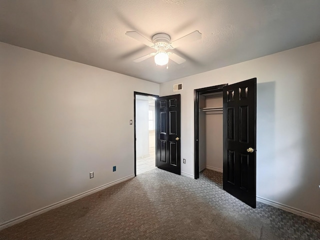 102 Janis St, Alvarado, TX 76009 - unfurnished bedroom with carpet floors, baseboards, a closet, and a ceiling fan