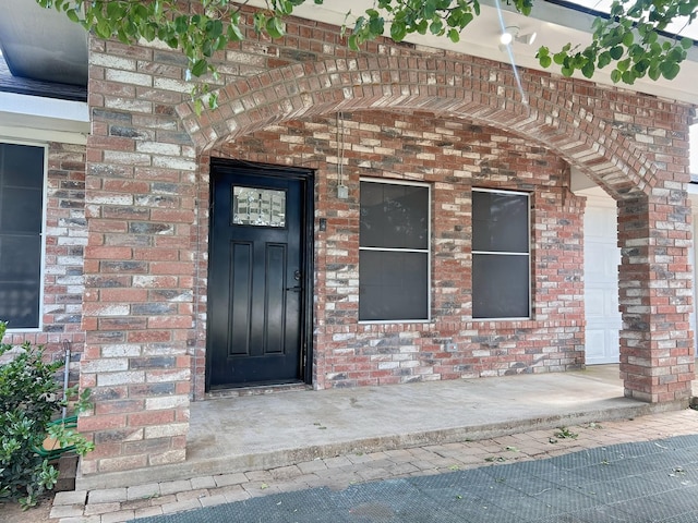 102 Janis St, Alvarado, TX 76009 - view of exterior entry featuring brick siding
