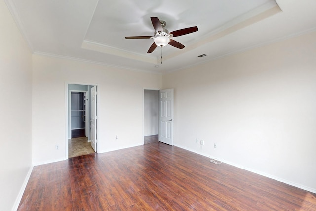 1278 Wysteria Ln, Burleson, TX 76028 - empty room with a raised ceiling, crown molding, ceiling fan, wood finished floors, and baseboards