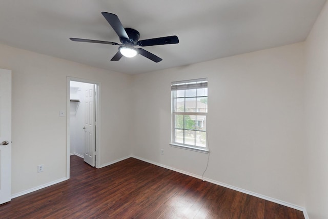 1278 Wysteria Ln, Burleson, TX 76028 - unfurnished room with dark wood-style floors, a ceiling fan, and baseboards