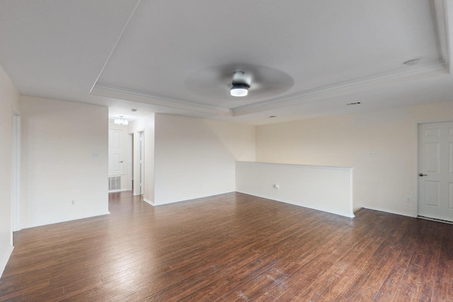 1278 Wysteria Ln, Burleson, TX 76028 - spare room with a raised ceiling, dark wood finished floors, and crown molding