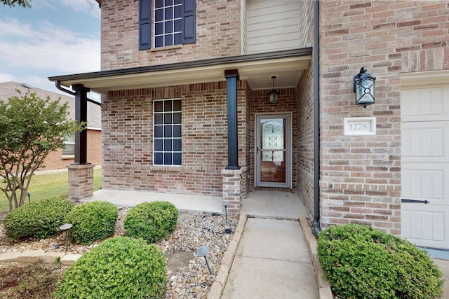 1278 Wysteria Ln, Burleson, TX 76028 - entrance to property with a porch and brick siding