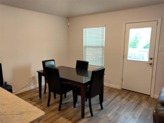 6029 Pathfinder Trl, Fort Worth, TX 76179 - dining area featuring light wood-style flooring, plenty of natural light, and baseboards