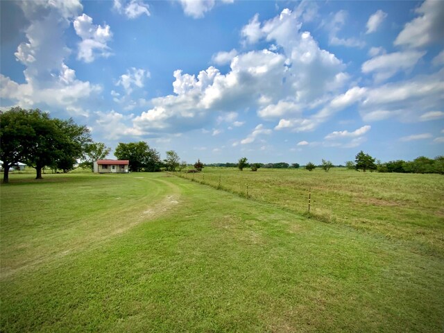 1409 W Trinity, Groesbeck, TX 76642 - view of yard with a view of rural / pastoral area and dirt driveway