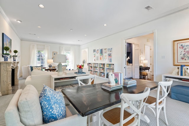 7215 Abrams Place Ct, Dallas, TX 75231 - dining space featuring ornamental molding, recessed lighting, and a fireplace