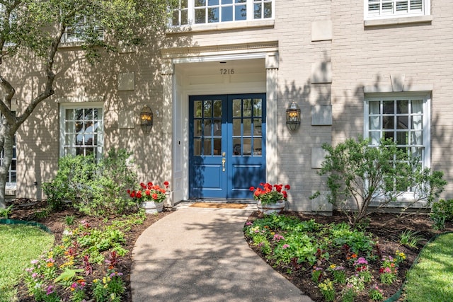 7215 Abrams Place Ct, Dallas, TX 75231 - doorway to property featuring french doors and brick siding
